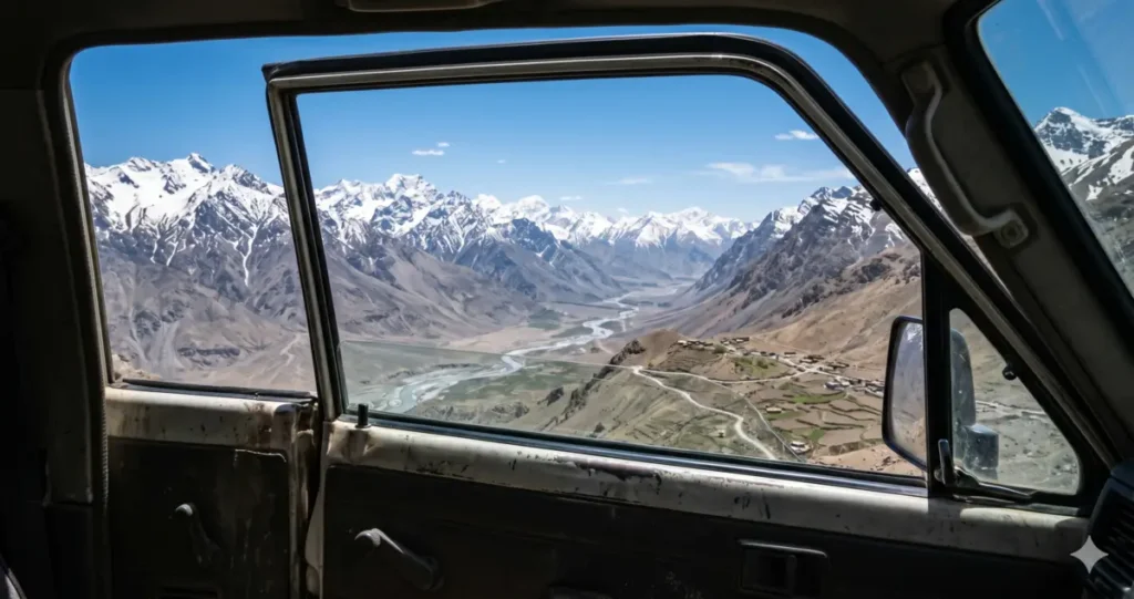Rugged mountain valley horizon viewed from a self-drive travel expedition rig