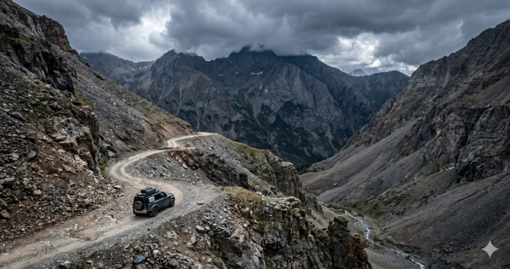 A rugged vehicle navigating a narrow mountain road under storm clouds, highlighting the real-world terrain variables that a generic travel planning app fails to calculate.