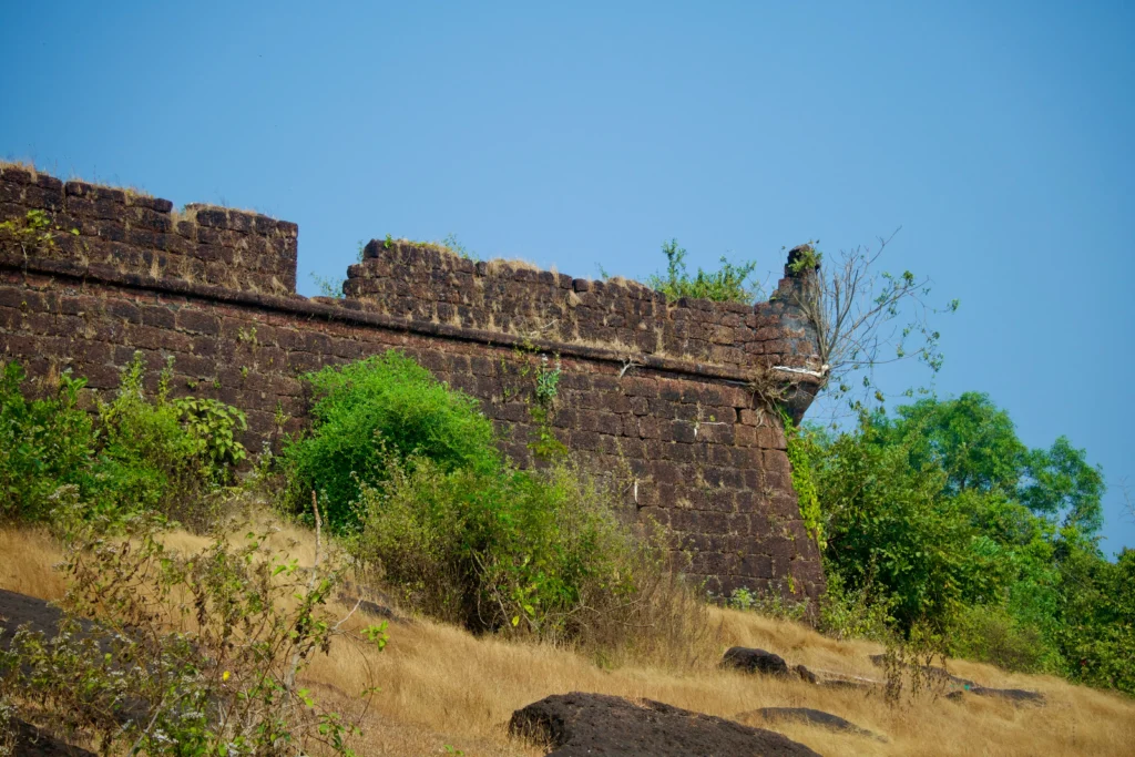 Top 10 places to visit in Goa - Scenic rocky cliffside trails at the ruins of Chapora Fort