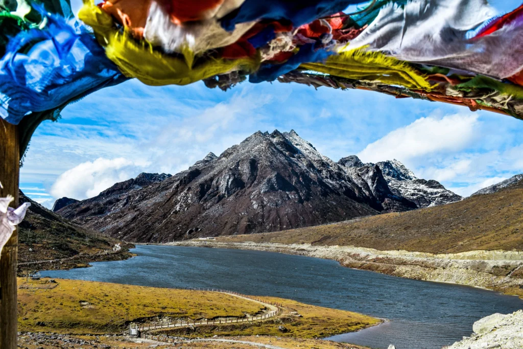Misty mountain pass in Tawang, a beautiful spiritual place to visit in July